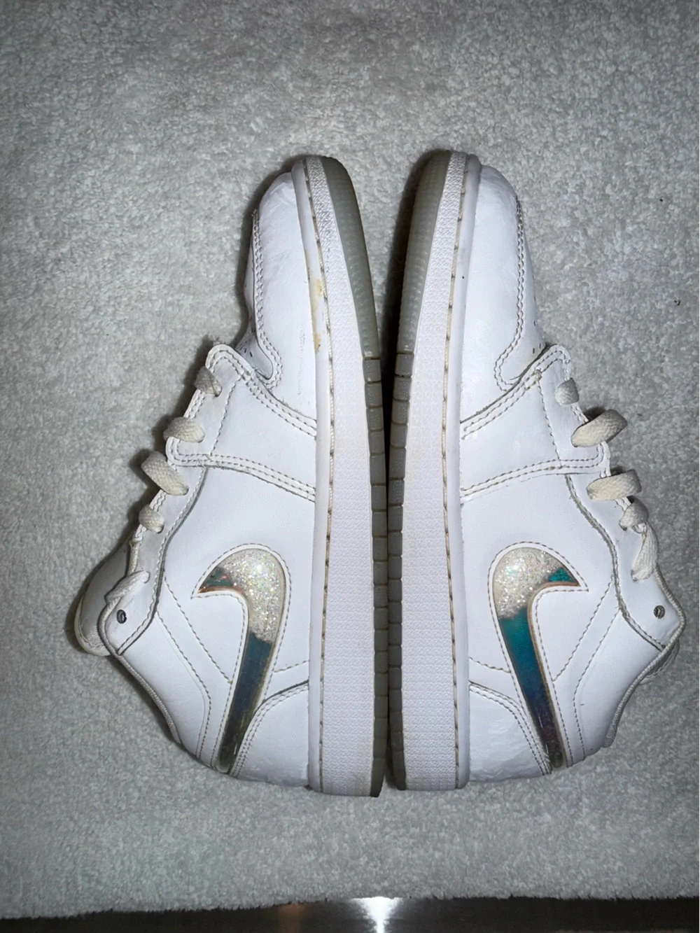 Nike Air Jordan’s White Low-Top Sneaker with Iridescent Swoosh Size 5Y